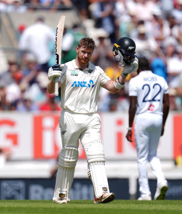 Glenn Phillips celebrates his century