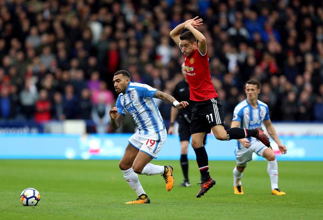 Huddersfield Town's Danny Williams (left) and Manchester United's Ander Herrera battle for the ball at the John Smith's Stadium 