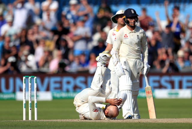 Nathan Lyon collapses to the floor at Headingley as an appeal comes to nothing