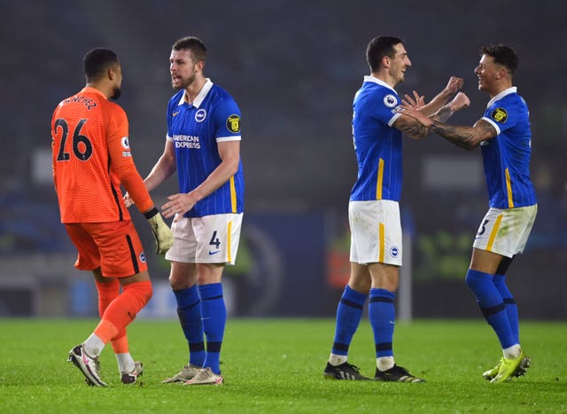 Brighton goalkeeper Robert Sanchez, left, celebrated a third successive Premier League clean sheet