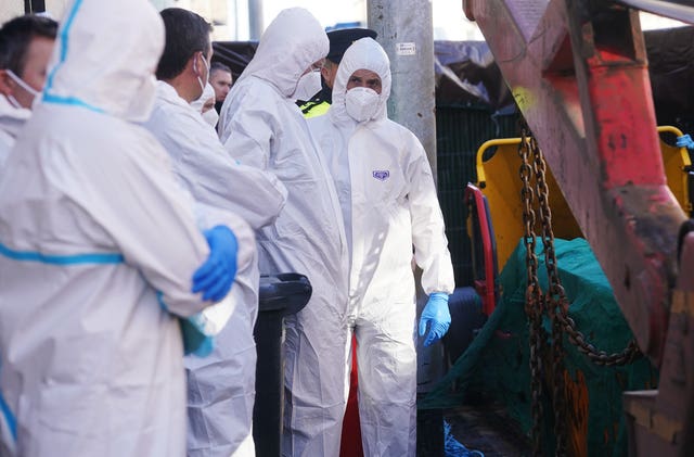Members of the Garda forensics at work