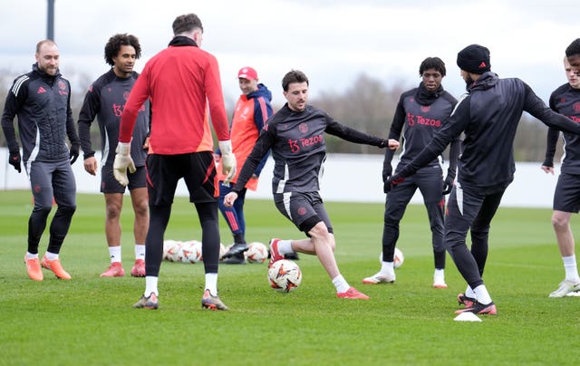 Mason Mount tries to intercept the ball during a drill at a Manchester United training session