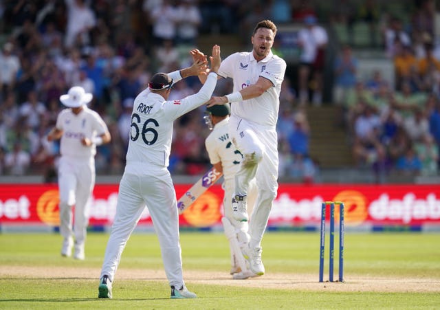 Ollie Robinson celebrates with Joe Root
