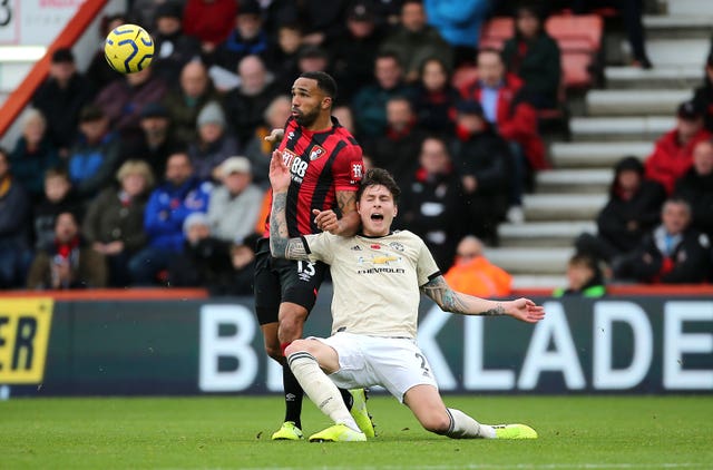 Bournemouth’s Callum Wilson and Manchester United’s Victor Lindelof battle for the ball