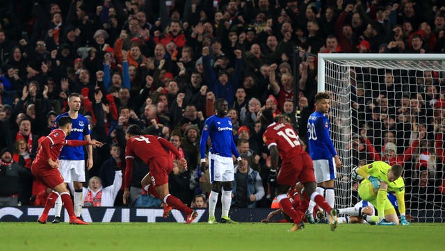 Liverpool and Van Dijk will look to bounce back from their defeat in Paris in the Merseyside derby (Peter Byrne/PA).