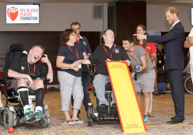 The Duke of Sussex speaks with boccia players during a visit to the RFU Injured Players Foundation’s annual Client Forum at Twickenham Stadium