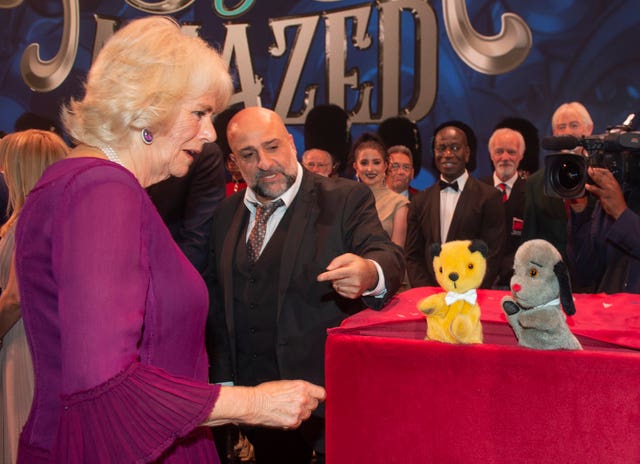 Camilla was pleased to meet her favourites Sooty and Sweep backstage at the end of the night. Julian Simmonds/The Daily telegraph