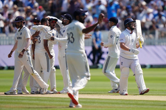 England’s Ben Duckett (right) walks off after being dismissed