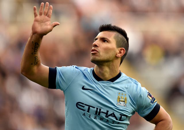 Sergio Aguero celebrates his 100th Premier League goal
