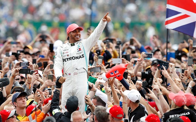 Lewis Hamilton celebrates winning this year's British Grand Prix by jumping into the crowd.