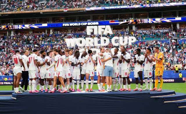 England players with their medals following the World Cup bronze medal match against France at the Miami Stadium
