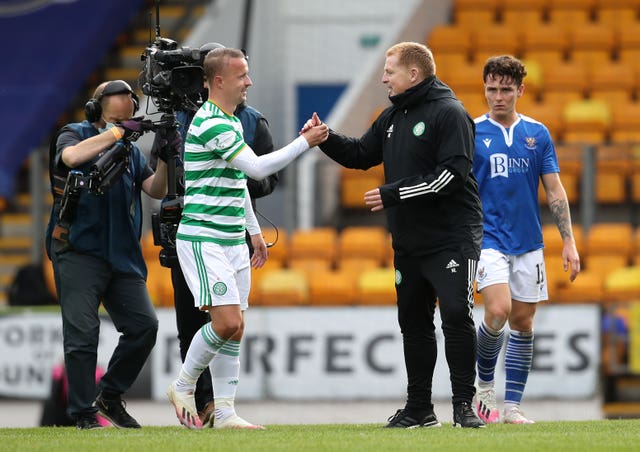 Celtic manger Neil Lennon (right) congratulates Leigh Griffiths after his goal rescued victory for the Hoops