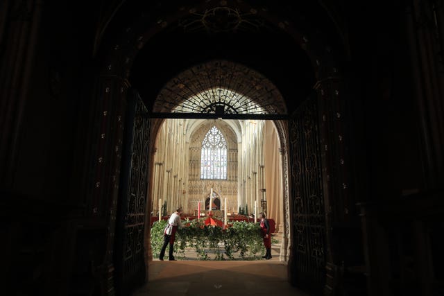 York Minster staff prepare the Advent wreath (Danny Lawson/PA)