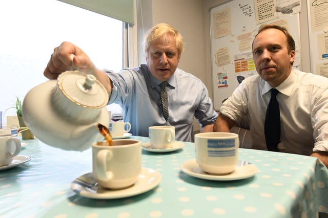Prime Minister Boris Johnson takes a tea break with Health Secretary Matt Hancock during a visit to Bassetlaw District General Hospital in Worksop, Nottinghamshire 