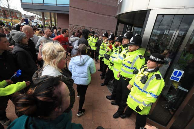 Police blocked protesters from the entrance to Alder Hey Children’s Hospital (Peter Byrne/PA)