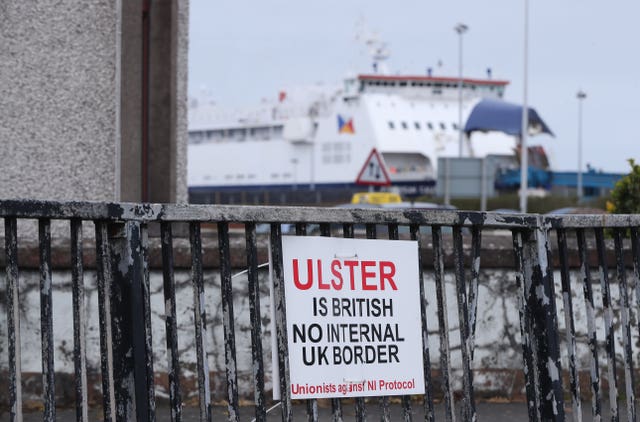 A sign protesting against the Northern Ireland Protocol in Larne Harbour, Northern Ireland