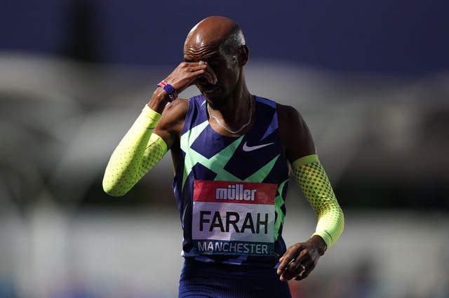 Great Britain's Sir Mo Farah reacts after failing to achieve the qualifying time in the men's 10000m final in Manchester