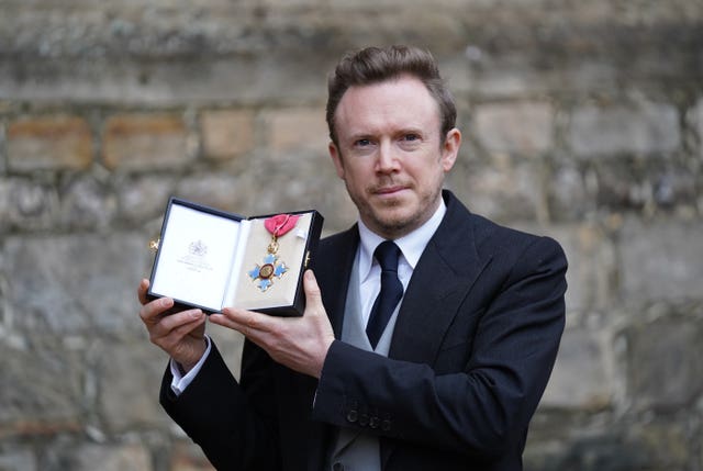 Conductor Dan Harding after he was made a Commander of the British Empire by the Princess Royal at Windsor Castle for services to music