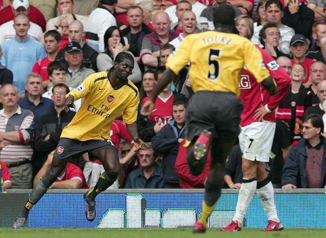 Emmanuel Adebayor (left) scored the last time Arsenal won at Old Trafford 