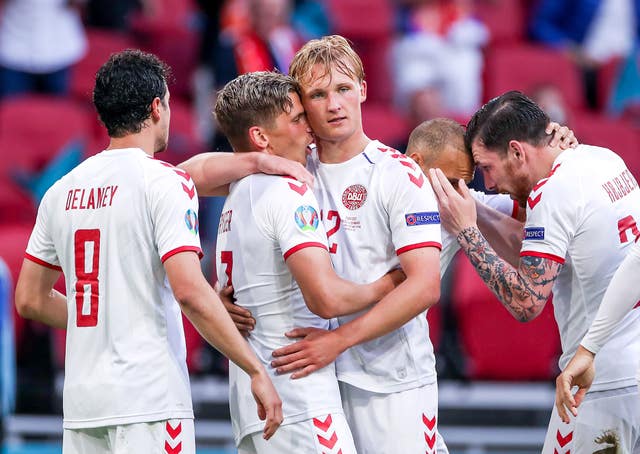 Denmark's Kasper Dolberg (centre) celebrates scoring against Wales in Euro 2020