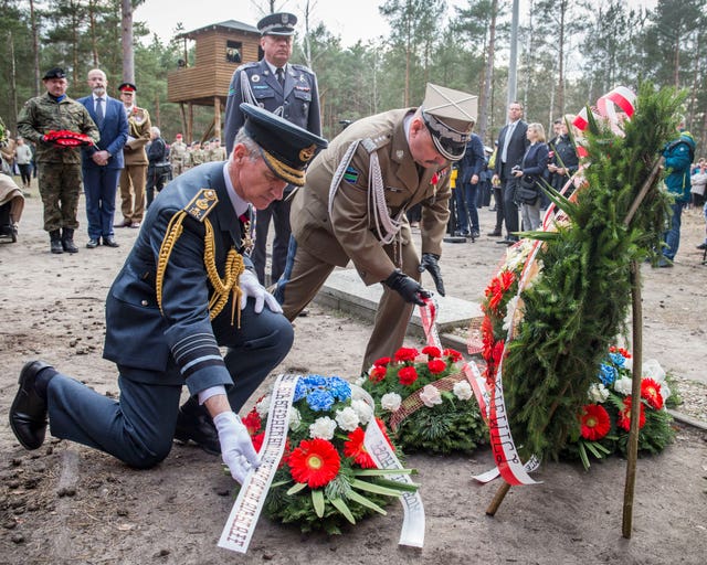 Chief of the Air Staff Sir Stephen Hillier and Lieutenant General Mika of the Polish army lay wreaths at a memorial service held at the former site of Stalag Luft III in Zagan, Poland, to commemorate the 75th anniversary of the Great Escape