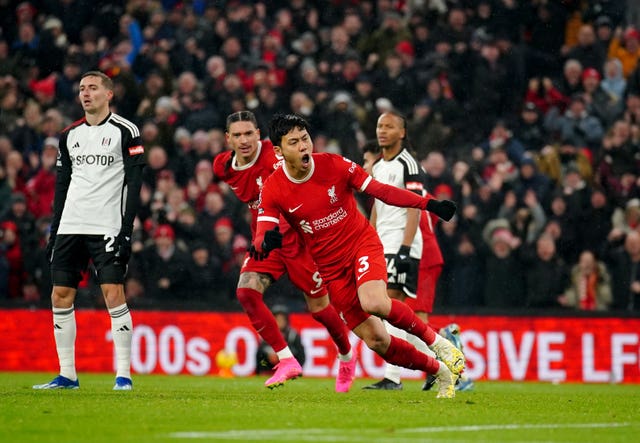 Liverpool''s Wataru Endo (centre) celebrates scoring his sides third goal