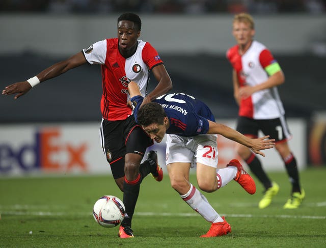 Terence Kongolo, left, could be joining Huddersfield 