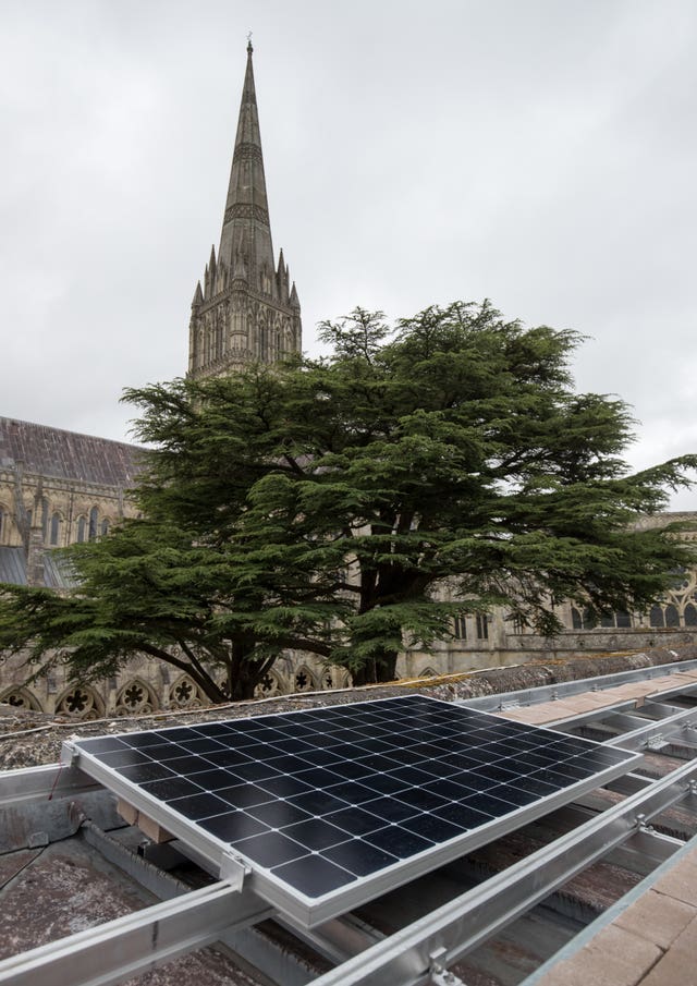 A solar panel is installed on the roof of Salisbury Cathedral’s south cloister, (Andrew Matthews/PA)