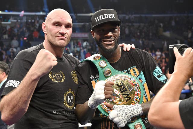 Tyson Fury, left, and Deontay Wilder will fight for a third time next month (Lionel Hahn/PA)