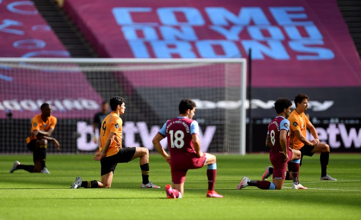 Players took a knee at the start of the match