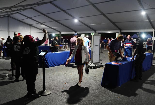 Fans go through security checks at the Ryder Cup