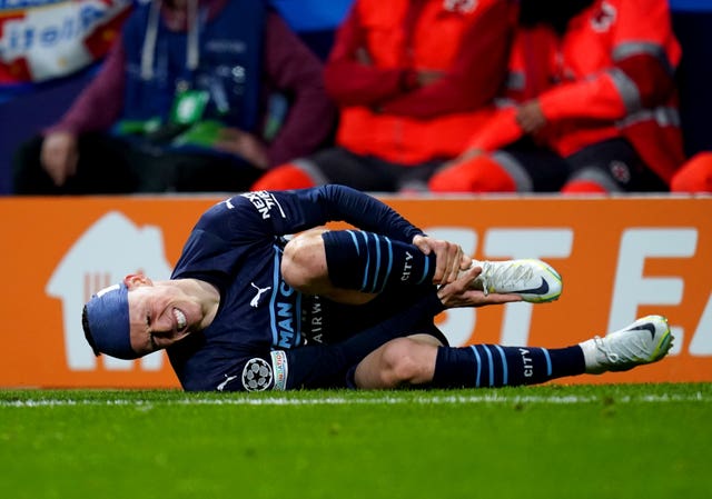 Phil Foden goes down injured