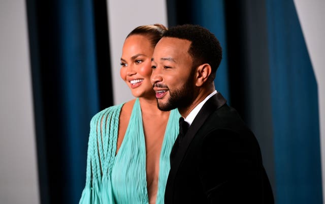 Chrissy Teigen and John Legend attending the Vanity Fair Oscar Party 