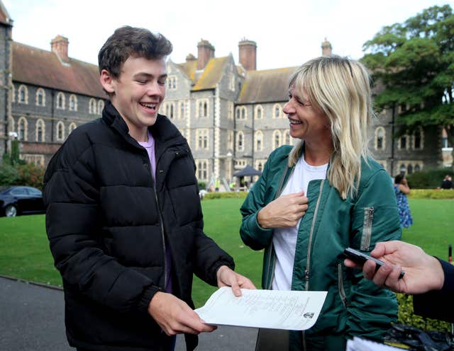 Woody Cook is congratulated by his mother, Zoe Ball