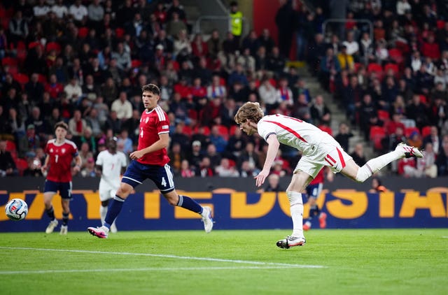 Anthony Gordon, right, heads England in front against Czechia