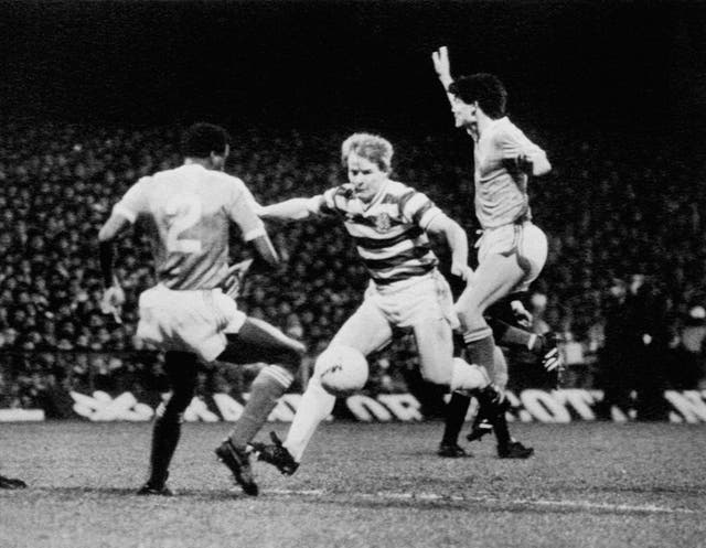 Murdo Macleod, centre, added a spectular late goal to seal victory for 10-man Celtic