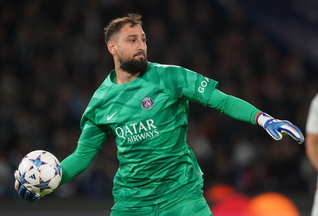 Goalkeeper Gianluigi Donnarumma prepares to throw the ball