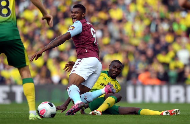 Norwich's Ibrahim Amadou tackles Wesley at Carrow Road