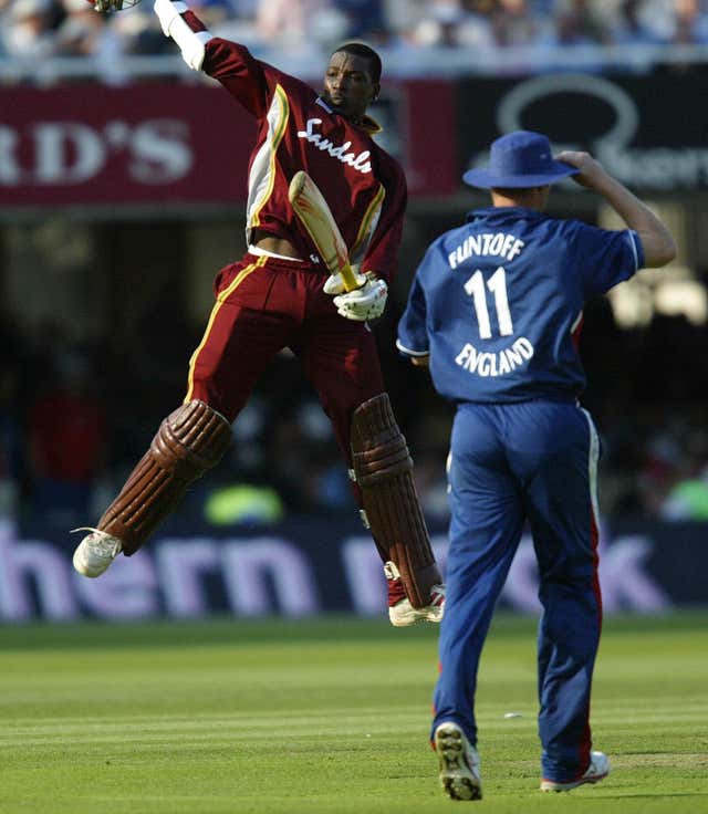 Chris Gayle, left, celebrates after leading the West Indies to victory at Lord's in 2004