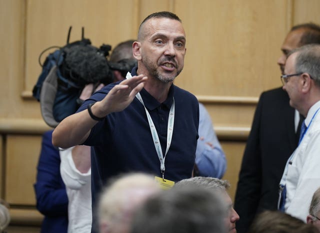 A man interrupts Taoiseach Leo Varadkar during his speech on the third day of the Consultative Forum on International Security Policy at Dublin Castle