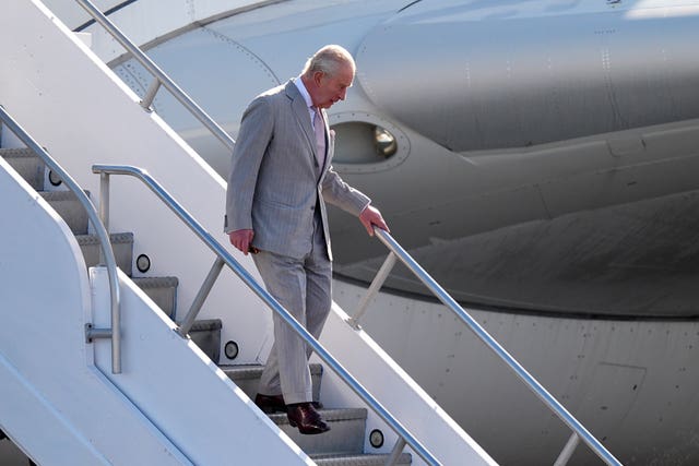 Charles descends from Voyager at Lynden Pindling International Airport, in Nassau