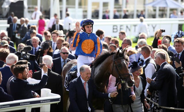 Donnacha O’Brien and Forever Together return to the winner's enclosure after winning the Investec Oaks