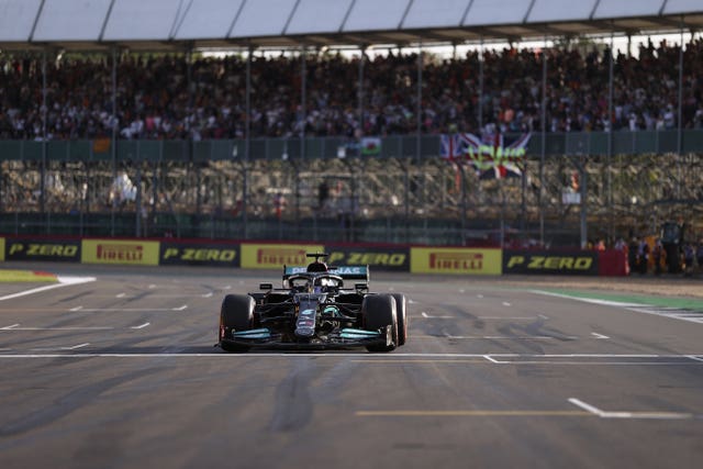 Lewis Hamilton crosses the line 