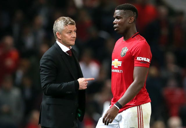Ole Gunnar Solskjaer (left) now manages Pogba in United's first-team.