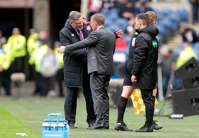 Brendan Rodgers, centre, was the victorious of the two managers