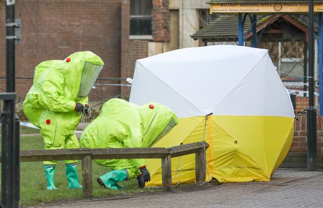 Personnel in hazmat at the Maltings shopping centre in Salisbury