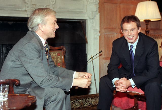 Britain’s then prime minister Tony Blair (right) talks with a younger John Humphrys