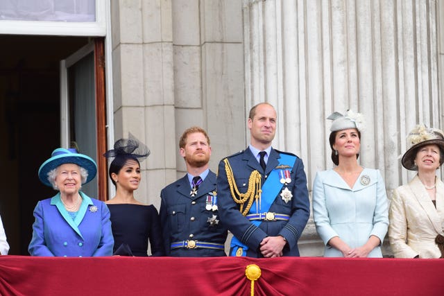 The Sussexes with the royal family on the Palace balcony at the RAF centenary celebrations