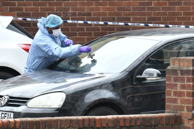 Forensic investigators at the scene