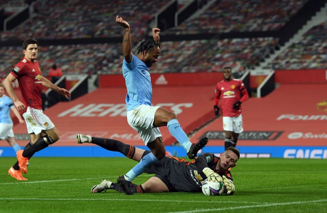 Dean Henderson, bottom, has made 25 appearances in all competitions for Manchester United this season